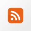 White RSS feed symbol on an orange rounded square background